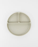 Assiette en silicone compartimentée pour bébé couleur grège, vue du haut.